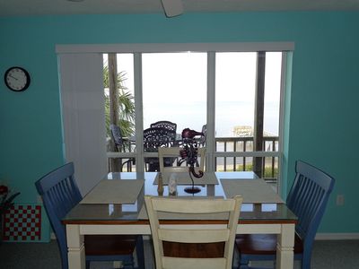 View from Kitchen to Dining Area overlooking Gulf and Sunsets.